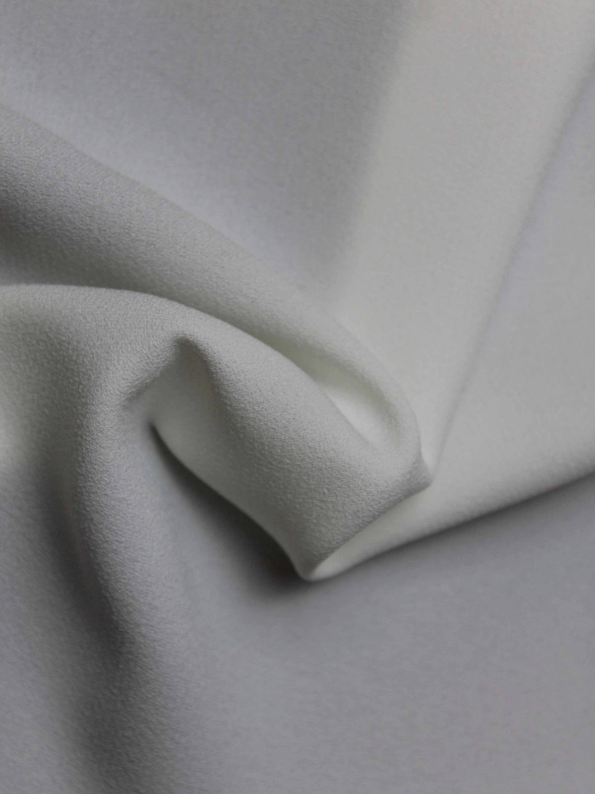 Ivory M/Wt Poly Crepe - P59