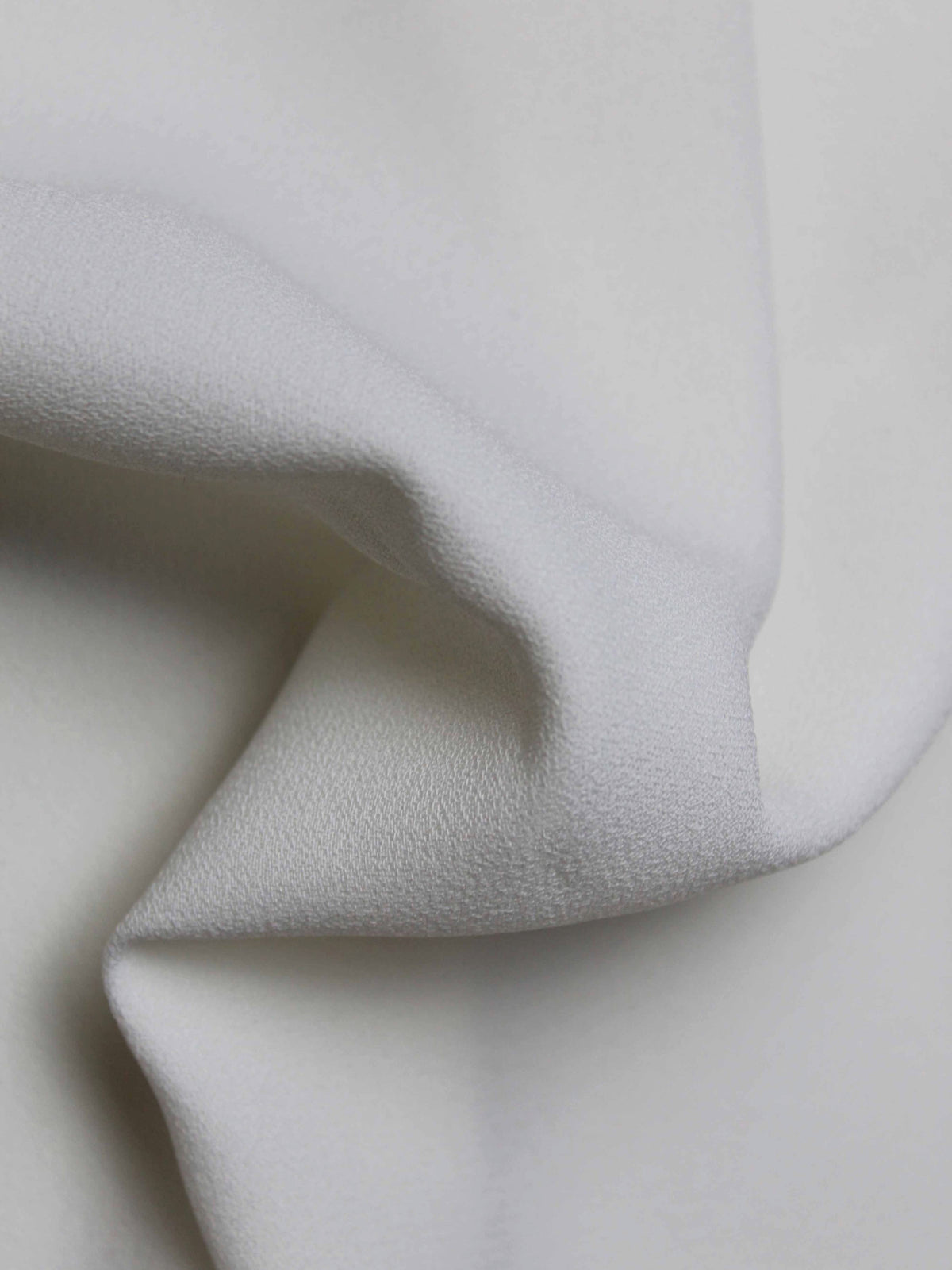 Pale Ivory M/Wt Poly Crepe - P59