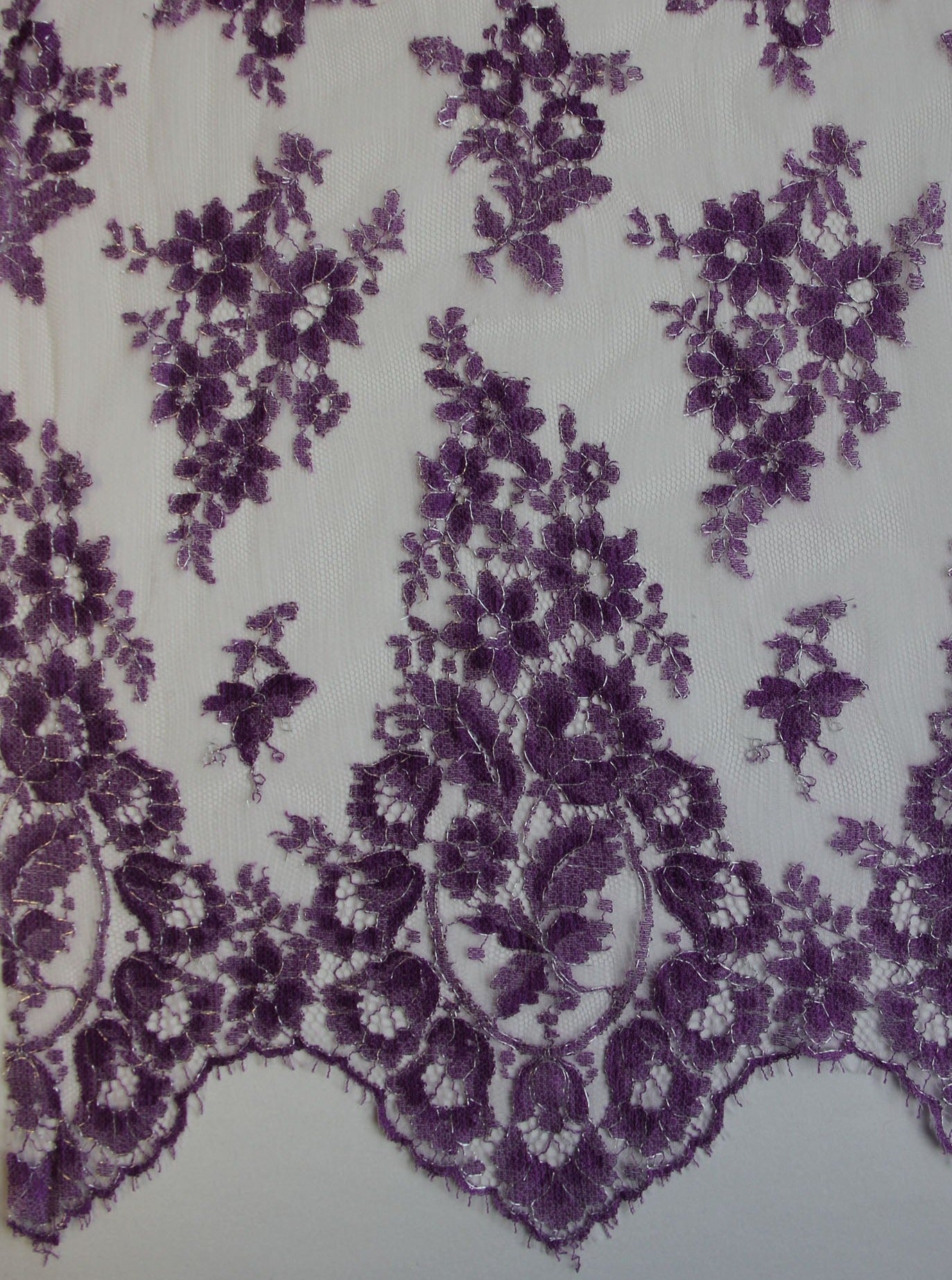 http://www.bridalfabrics.com/cdn/shop/products/violet-lace-wendy.jpg?v=1674672210