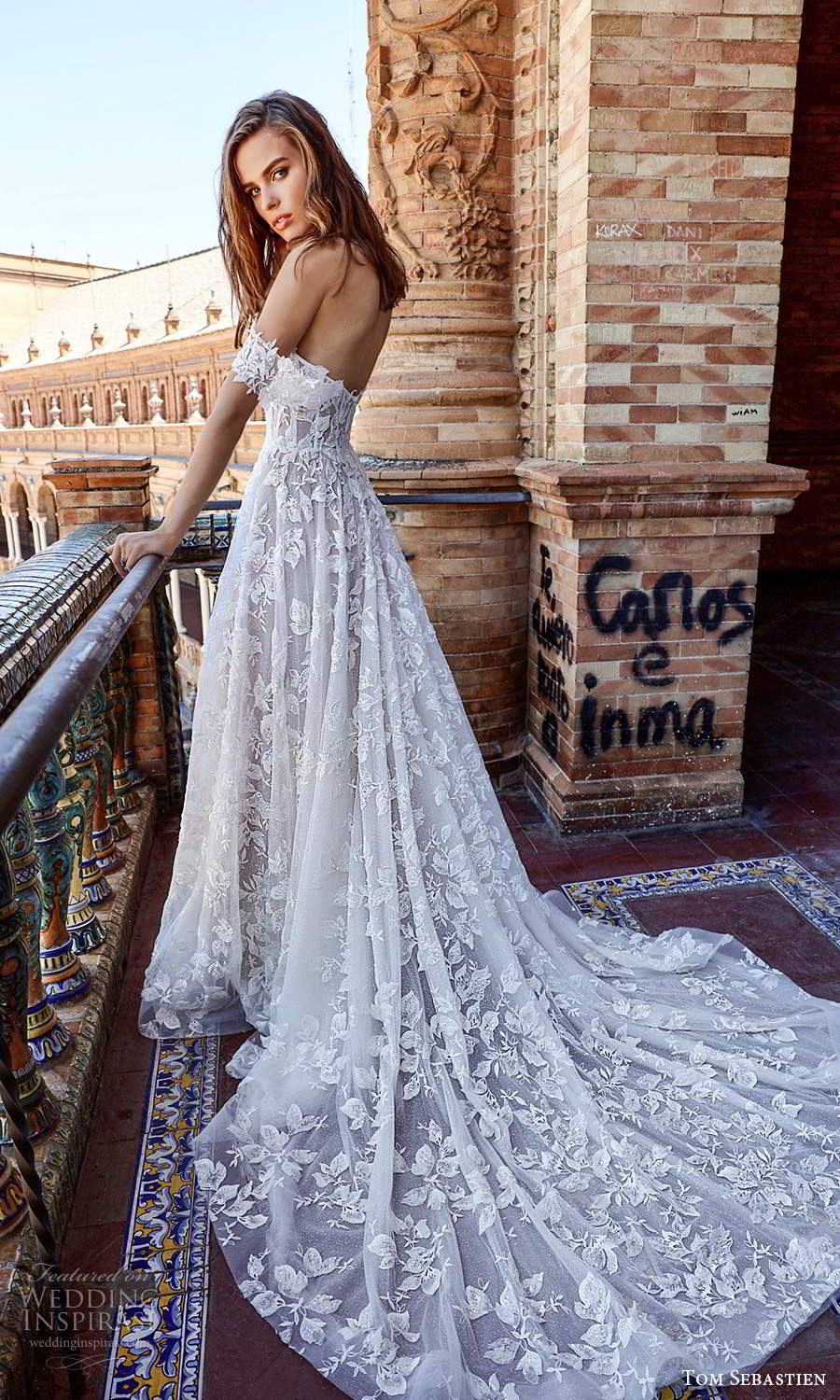 A super glamorous ivory bridal gown that uses Sigourney Lace
