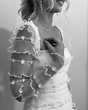 Amazing sleeves on this wedding dress using ivory layered lace Araceli 1