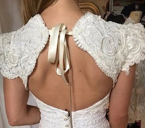 Back detail on wedding dress using ivory corded alce Boh 1