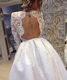 Ivory wedding dress with cut out back detail using ivory lace Charvi  10