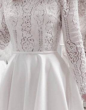 Long sleeved wedding dress using ivory beaded lace fabric Magnolia 1