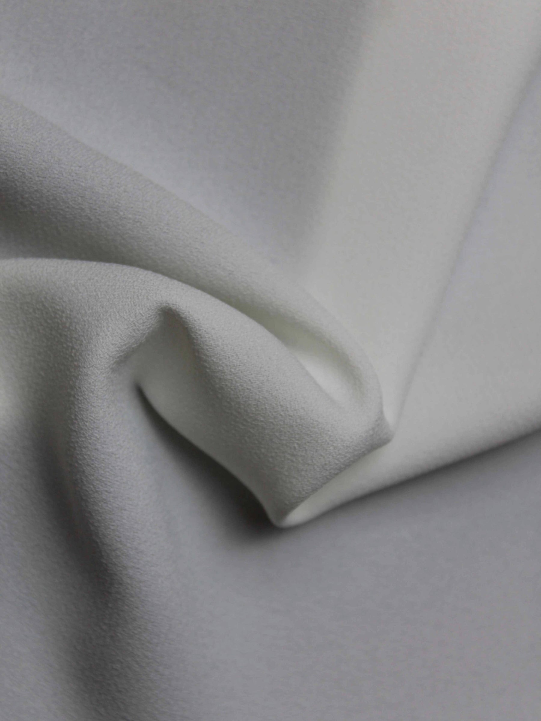 Ivory M/Wt Poly Crepe - P59