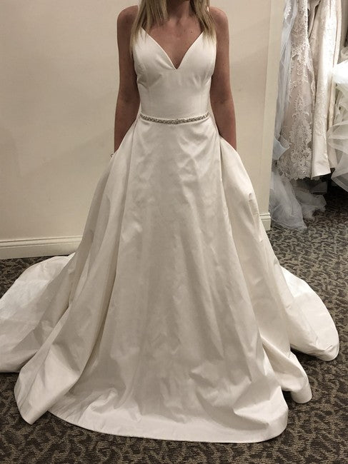 Clean silk dupion wedding ball gown with plunging V-neckline and keyhole  back. | Ball gowns, Justin alexander wedding dress, New wedding dresses